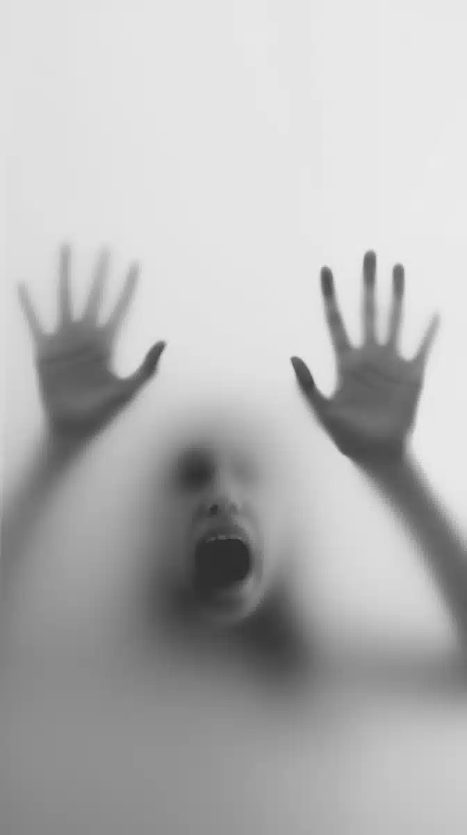 Eerie Hands Behind Glass